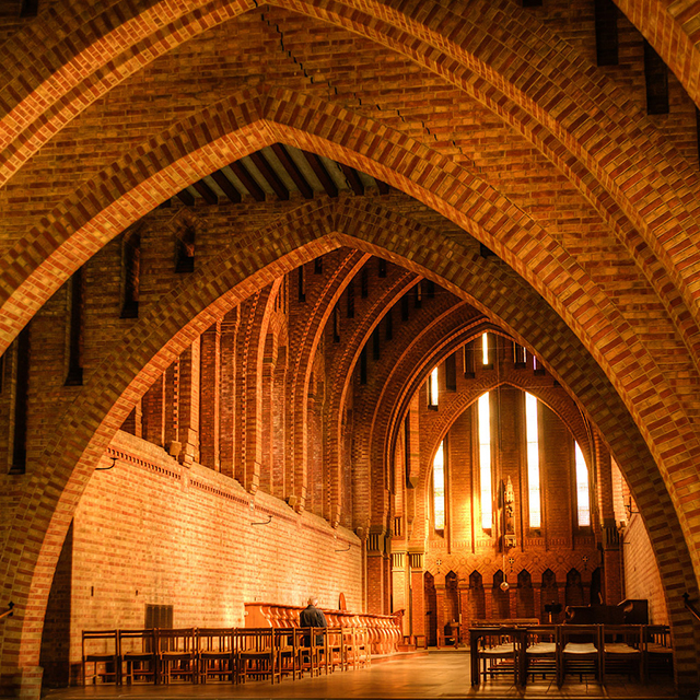 Red Brick Arches inside Quarr Abbey Chapel facing Altar of Christ